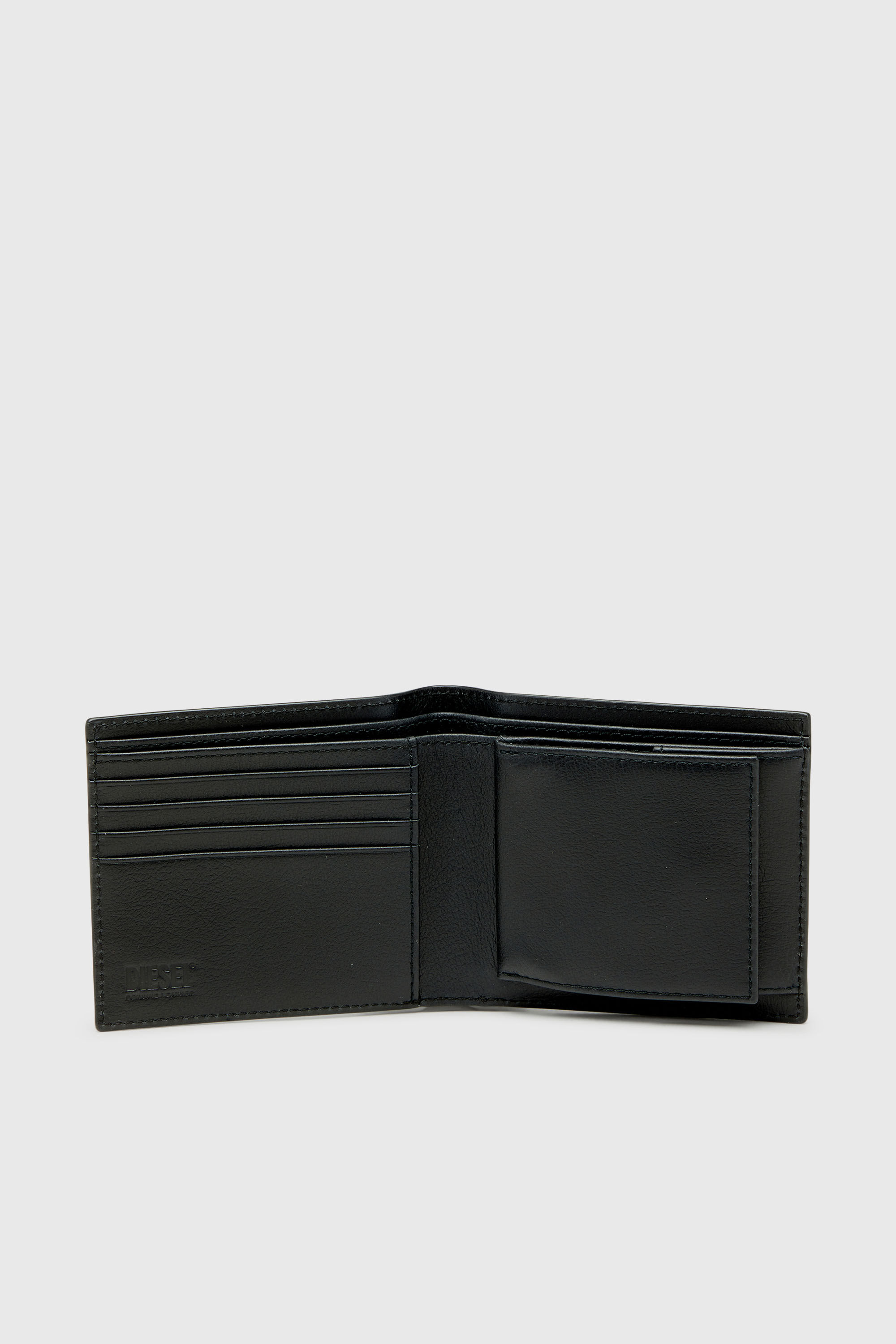 Diesel - MONOGRAM BI-FOLD COIN S 3D, Man's Leather bi-fold wallet with all-over embossed logo in Black - 3
